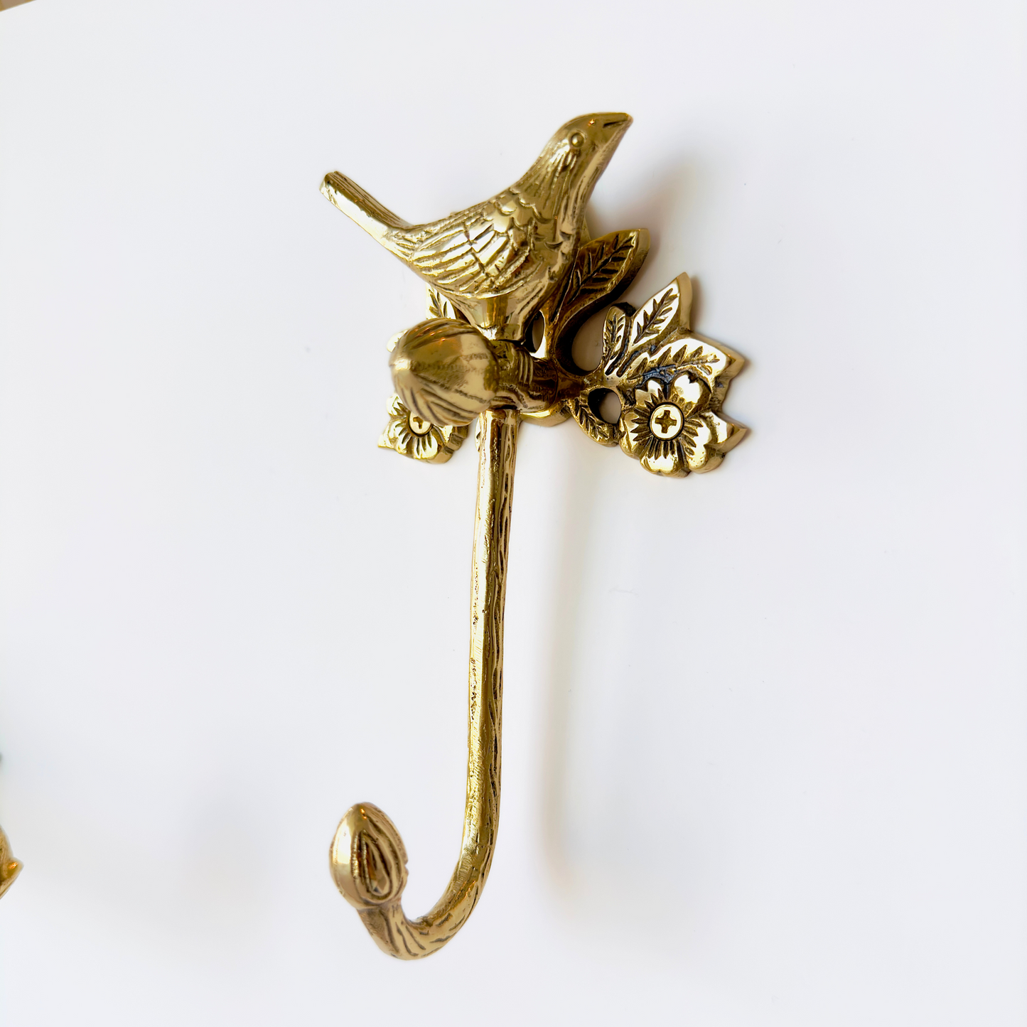 Gancio per uccelli in ottone lucidato